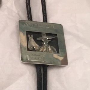 Cowdachrome silver bolo